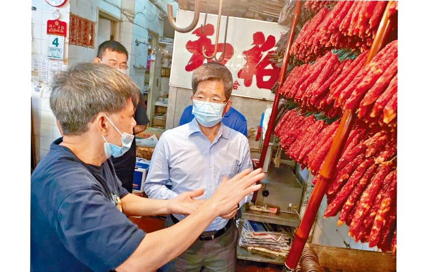 中聯辦12人落區訪街市商販